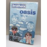 Oasis brothers book, signed by Liam Gallagher