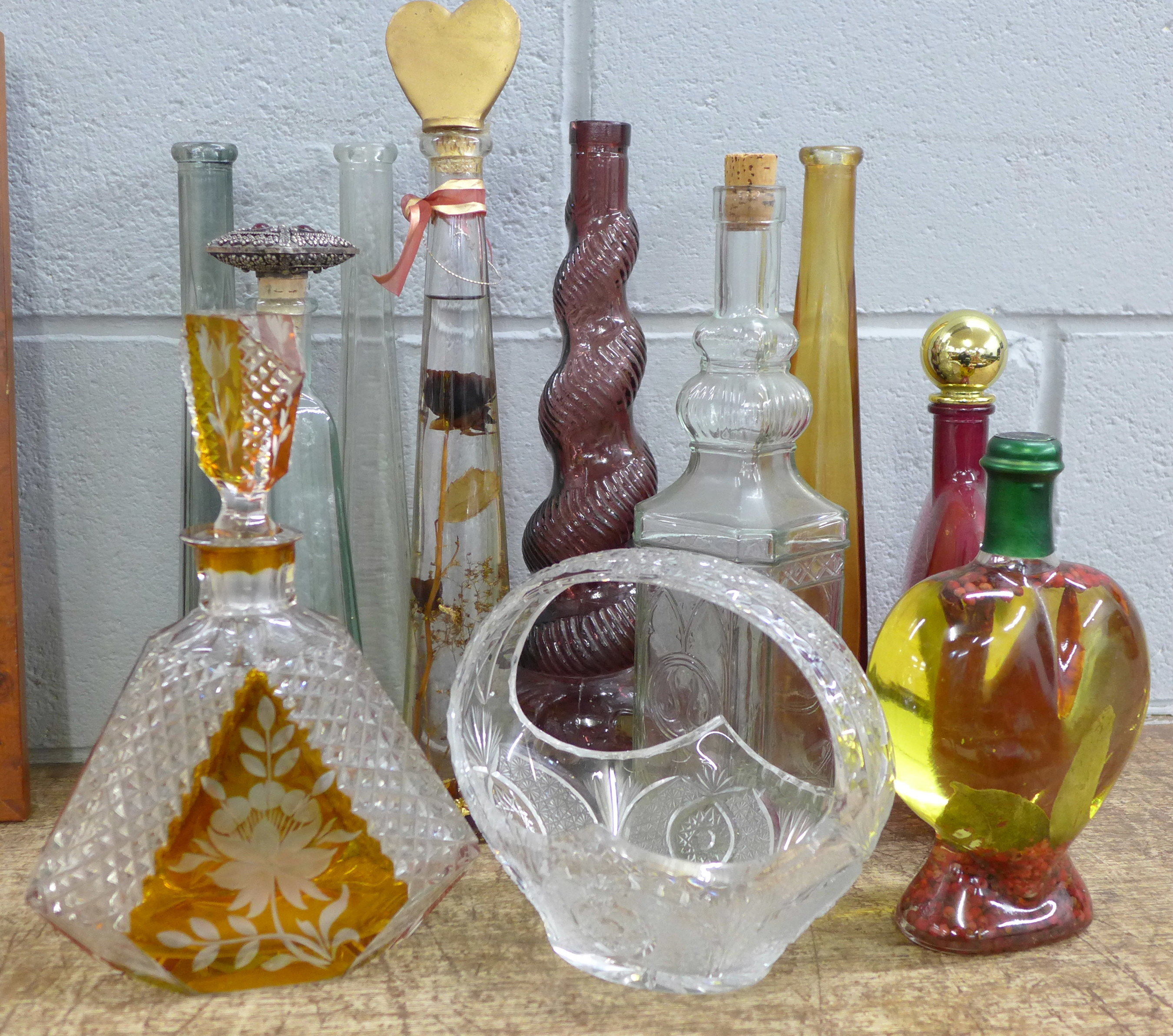 Glassware including amber cut glass scent bottle, decanters, bowl, bottles, etc.