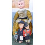 A pre WWII Dutch boy doll, a/f and three others