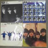 Four The Beatles LP records