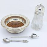 A silver topped glass sugar shaker, a hallmarked Victorian silver letter opener in the form of a