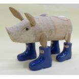 A novelty 'Hunter Wellingtons' advertising pig figure