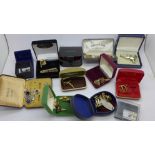 Assorted cufflinks and tie pins