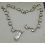 A vintage silver and crystal necklace