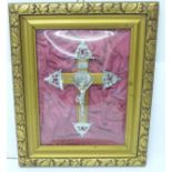 A framed and mounted crucifix