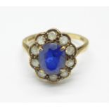 A 9ct gold, blue and white stone cluster ring, 2.5g, M