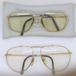 Two pairs of Christian Dior spectacles, one with pouch