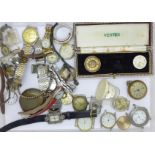 A collection of watches and parts, and a Vertex box