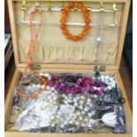 Fashion and costume jewellery including agate and amber in a jewellery box