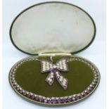 A vintage diamante necklace and brooch