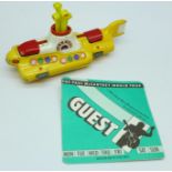 A Corgi Toys Beatles Yellow Submarine and a Paul McCartney Guest pass