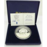 A silver proof Royal Mint year 2000 £10 Guernsey coin, limited edition of 950, with box and