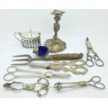 A silver mounted toasting fork, a candlestick, a chick pin cushion, a mustard, two pairs of grape