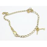 A 9ct gold charm bracelet, 4g