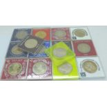 Fourteen commemorative coins, cased