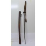 A Japanese WWII military sword, type 94, with scabbard, length of blade 69.5cm