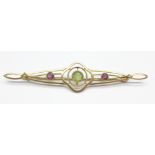 A 9ct gold, peridot and amethyst brooch, 2.4g