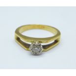 A yellow metal, diamond solitaire ring, tests as 18ct gold, hallmark worn, 3.4g, J