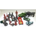 A part lead chess set, a metal bull and four die-cast vehicles