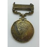 A King George VI India General Service medal with North West Frontier bar, 1937-39, to 543022 A.C.I.