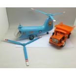 Two Marx toys, battery operated Power-Mite dump truck and an Air Sea Helicopter, boxed