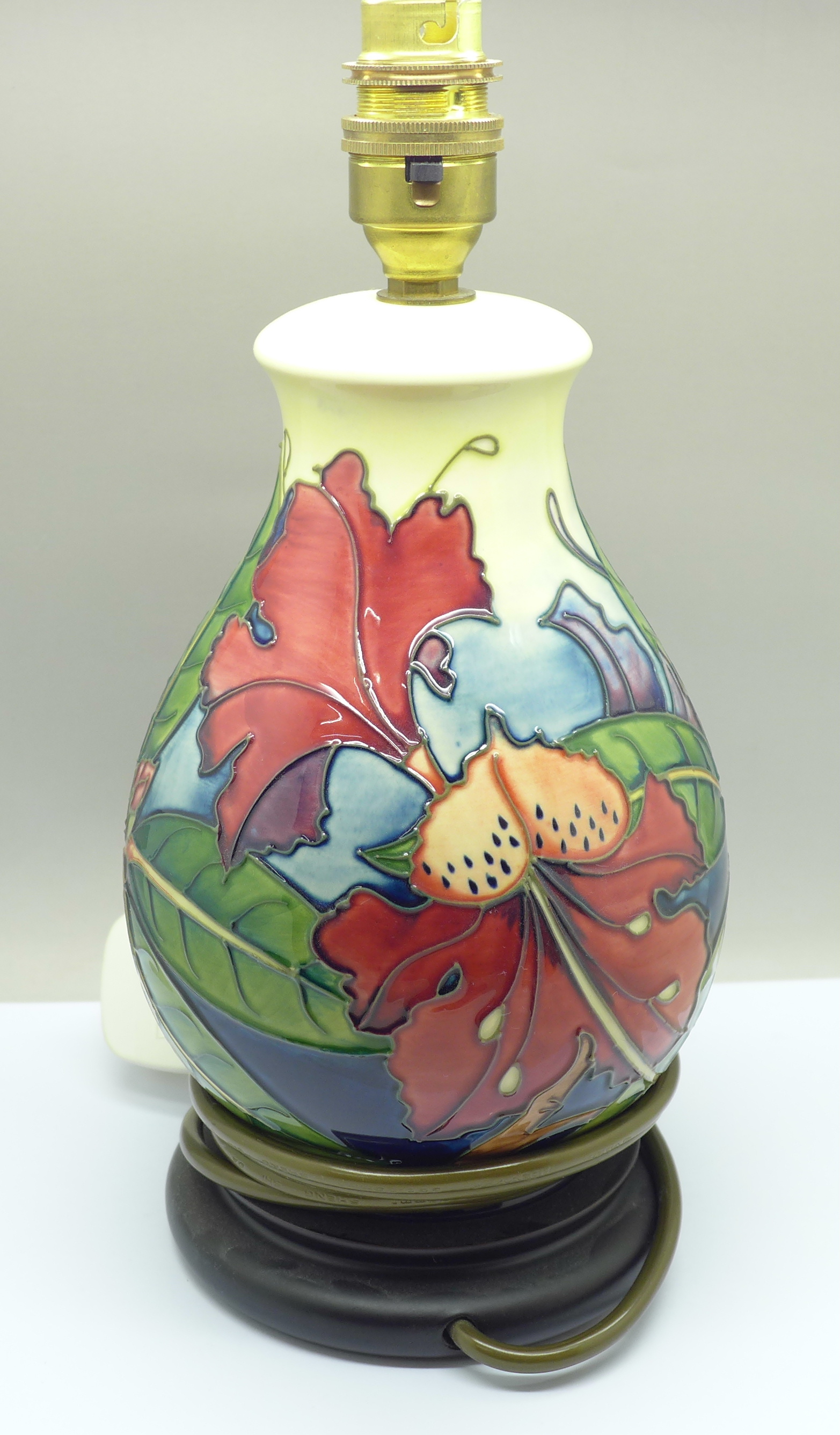 A Moorcroft table lamp base, with box, height with bulb fitting 27.5cm