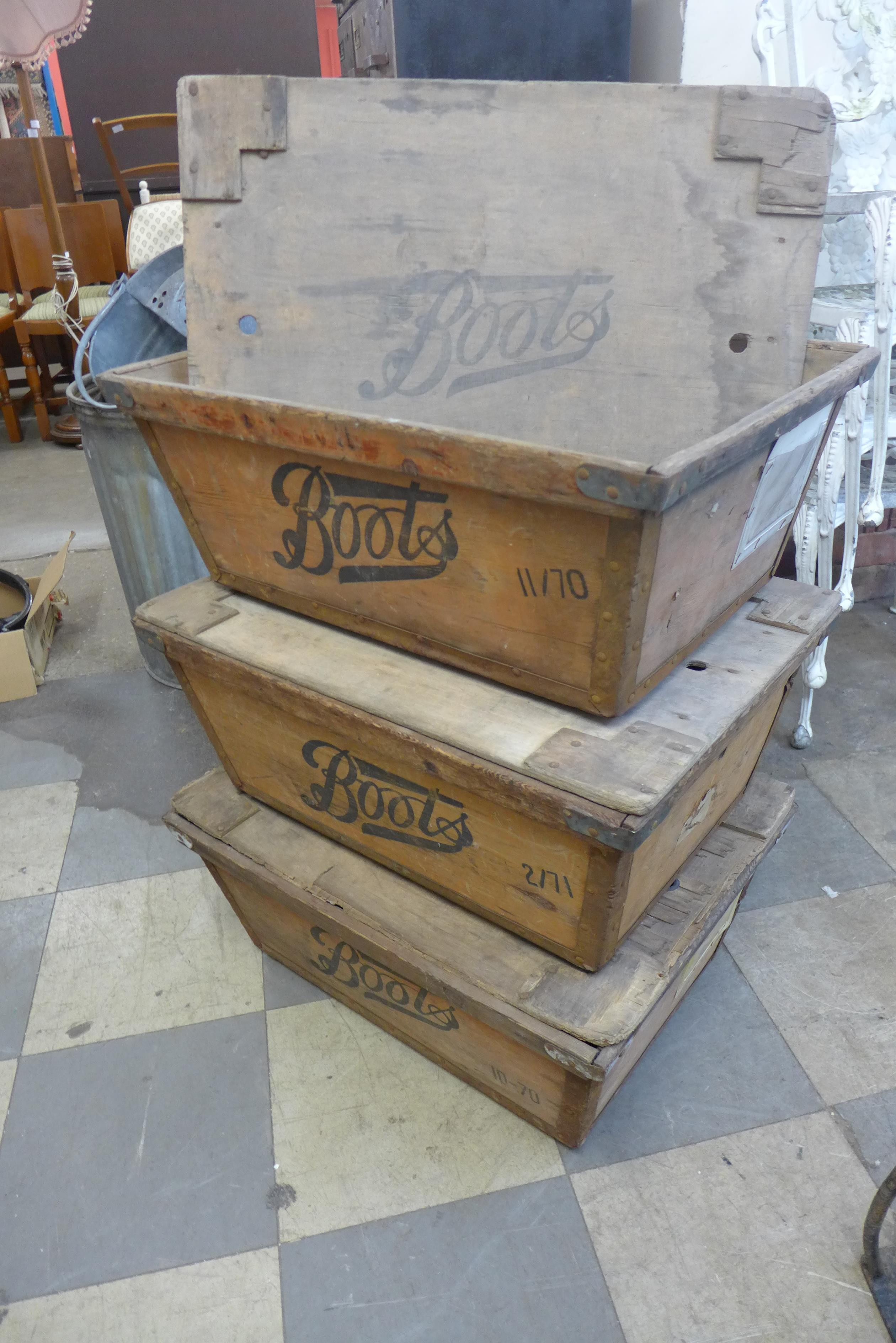 A set of three Boots wooden delivery boxes