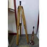 A tripod floor standing lamp and a table lamp