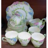 A Royal Grafton Garden Glories Art Deco tea set, six cups, seven saucers, cream, sugar and cake