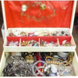 A jewellery box containing fashion and costume jewellery and wristwatches