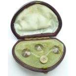 A boxed set of collar studs, one stamped 15ct and set with a rose cut diamond, (3+1)