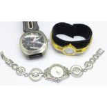 A lady's Citizen Eco-Drive wristwatch, a gentleman's Guess steel wristwatch and a lady's Swatch