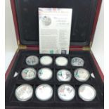 A set of twelve The Royal Mint 2012 A Celebration of Britain .925 silver £5 proof coins, cased