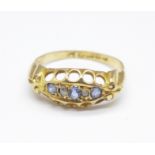 An 18ct gold, sapphire and diamond ring, two stones replaced, 2g, J
