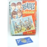 A Beatles 1960's jigsaw and a small George Harrison flag