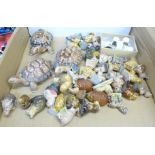 A collection of Wade Whimsies and thimbles