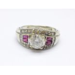 A white metal set Art Deco style diamond and ruby ring, main stone approximately 1carat diamond