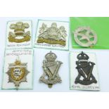 Six cap badges