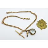 A 9ct gold double Albert chain, each link marked 9 and 375, with metal compass charm and a metal