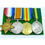 Four medals; WWI trio and Territorial Efficiency Medal to 1657 Pte. F.E. Smith 9/L.Pool R.