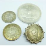 Three Victorian silver coins, an 1897 one florin, a 1900 half crown and an 1888 one florin, mounted,