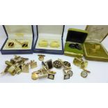 A collection of vintage cufflinks including three boxed sets and mother of pearl set