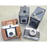 Duo-Ensign 2¼ B camera, a Voigtlander camera and two others