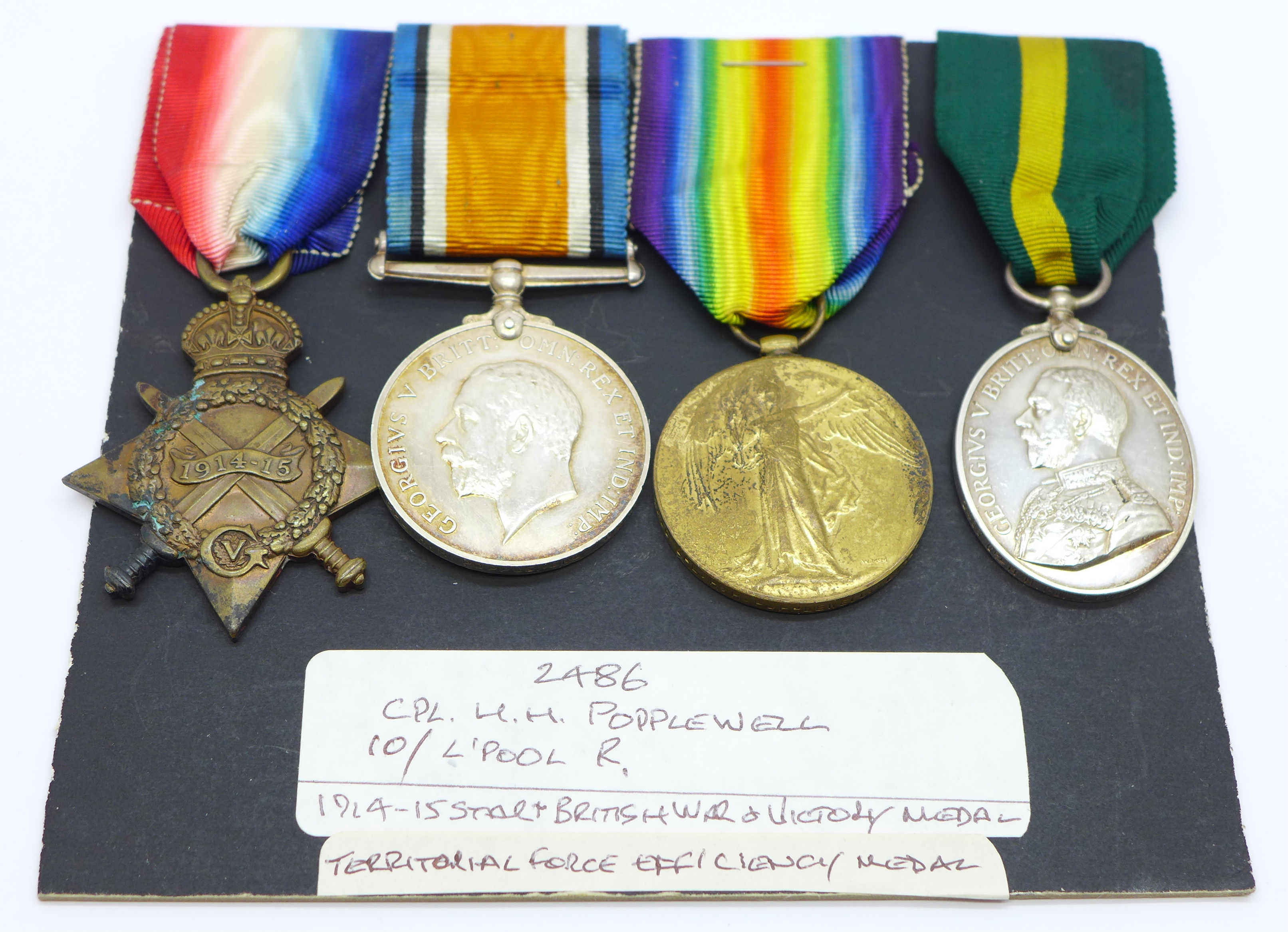 Four medals; WWI trio and Territorial Efficiency medal to 2486 Cpl. H.H. Popplewell 10/L'Pool R.