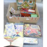 A collection of toys including a tin-plate 'bathing hut', table croquet, also games including Pop-