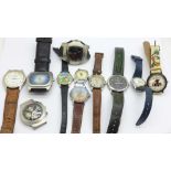 A collection of wristwatches including one novelty football and one Yogi bear