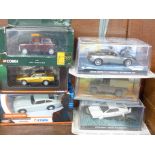 Six model vehicles;- four by Corgi, Land Rover, TR7, Mini limited edition, James Bond Thunderball