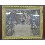 A framed French WWI commemorative with three medals