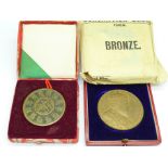 An Edward VII 1902 Coronation medal in bronze, cased and with original envelope and a Chinese medal,