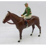 A Britains racing colours horse and jockey, jockey a/f